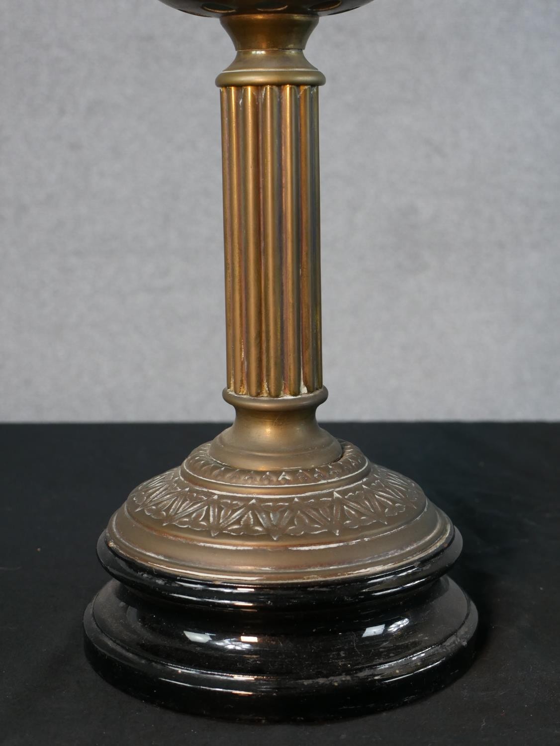 Three Victorian brass oil lamps, one with a spherical etched glass shade and a glass funnel, on an - Image 6 of 16