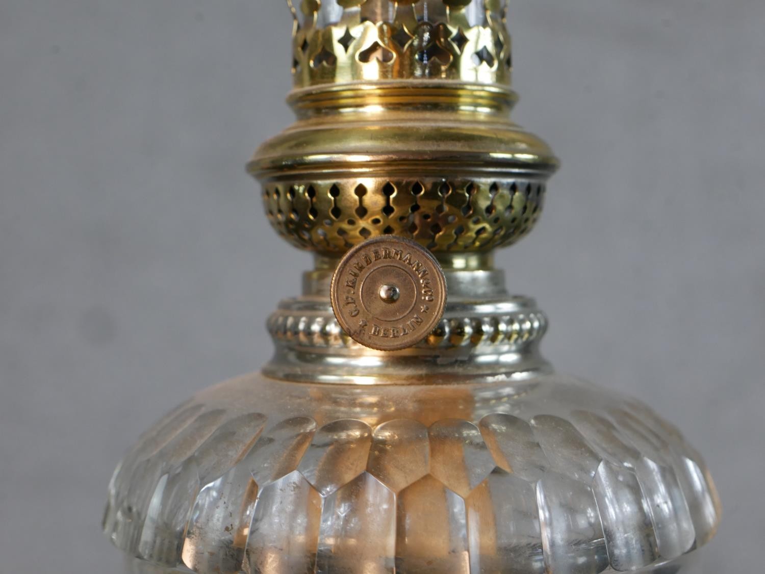 Three Victorian brass oil lamps, one with a spherical etched glass shade and a glass funnel, on an - Image 12 of 16