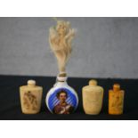 Three etched bone Chinese snuff bottles along with a Bavarian printed ceramic snuff bottle with