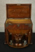 An early 20th century oak and silver plated mounted twin handled smokers cabinet, with hinged lid