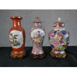 Three Chinese porcelain vases comprising of a possibly Republic period baluster vase with panels