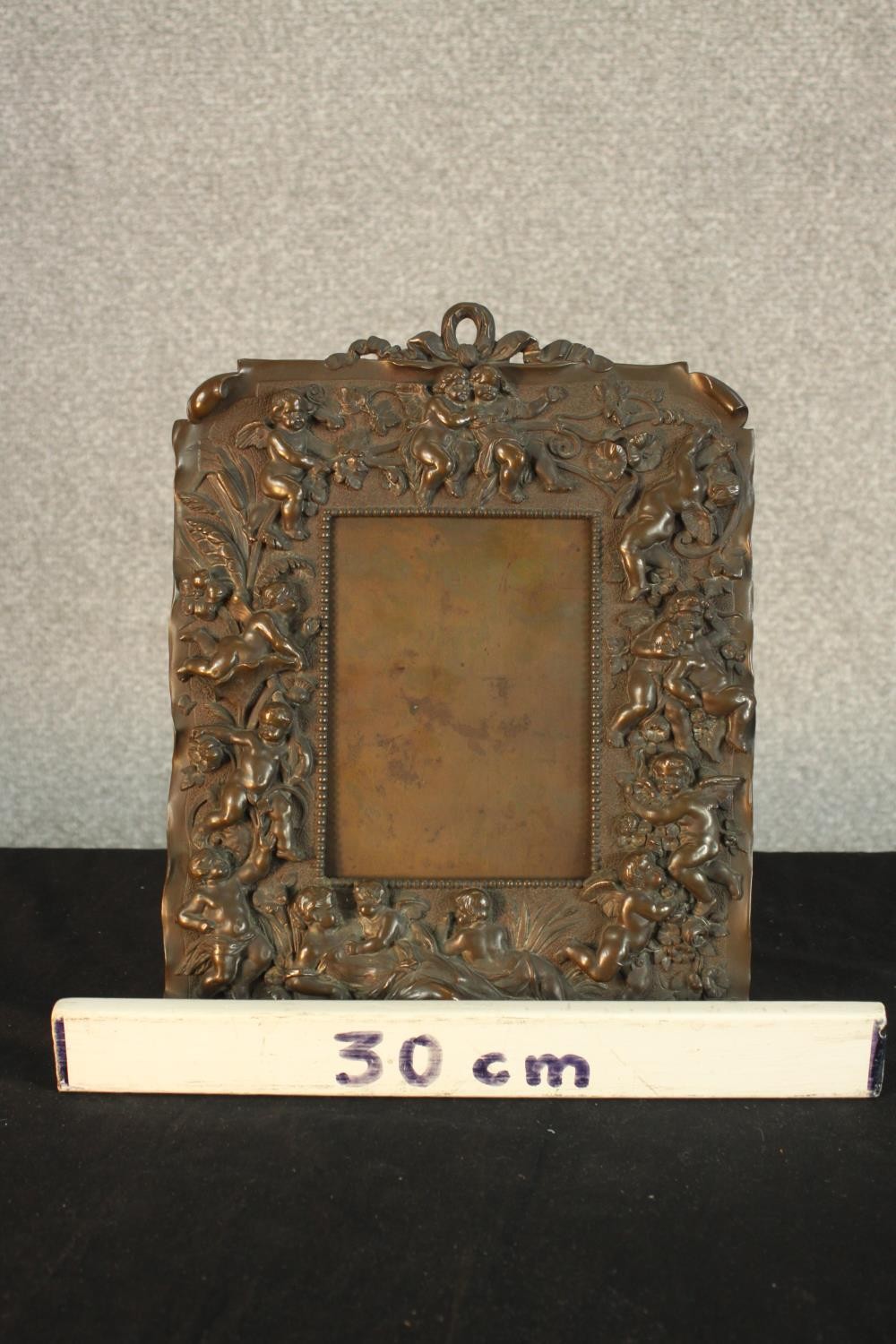 A late 19th/early 20th, possibly Italian cast bronze easel picture frame, with fiigural and putti - Image 2 of 10