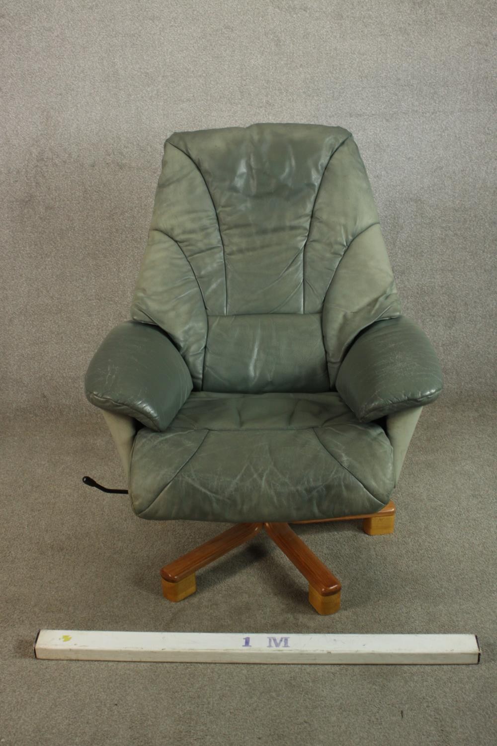 A 20th century pale green leather swival and counter leaver arm chair raised on five splayed - Image 2 of 8