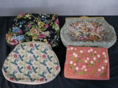 Four Danish early 20th century needlepoint tapestry floral design ladies evening bags. H.37 W.41 D.