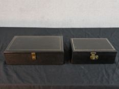 Two mid to late 20th century black faux leather jewellery boxes, one fitted and lined with red