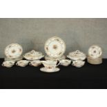 A Spode Rockingham part dinner service to include plates, soup bowls, lidded tureens and sauce boat.