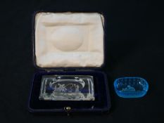 Two Bohemian intaglio crystal pin dishes, a cased clear glass dish with Classical Neptune and