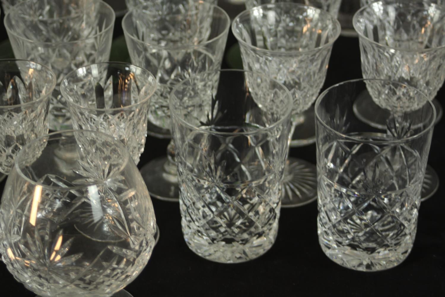 Aprroximately fifty mid / late 20th assorted cut glass drinking glasses together with decanters. H. - Image 5 of 9