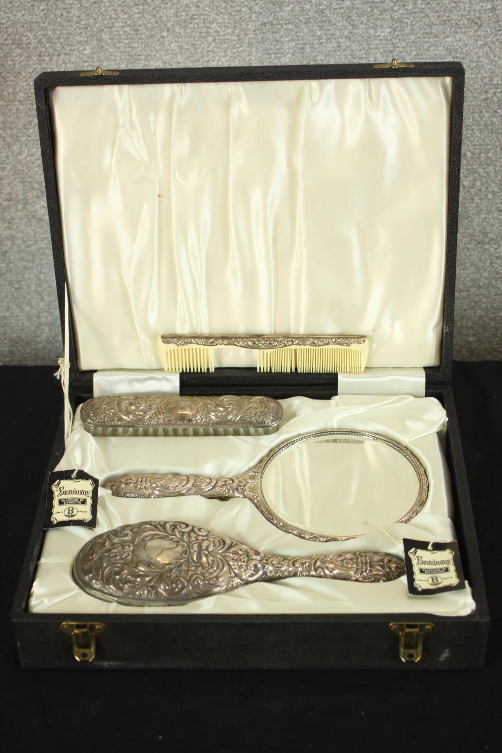 A George VI hallmarked silver Silver vanity set four piece cased vanity set, W I Broadway & Co