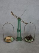 A set of early/mid 20th century painted cast iron balance scales complete with weights. H.96 W.89