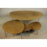 A nest of four late 20th century/contemporary Stua Eclipse oak topped occasional tables, designed