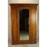 A 19th century mahogany single mirrored door gentlemen's wardrobe, opening reveal shelves and