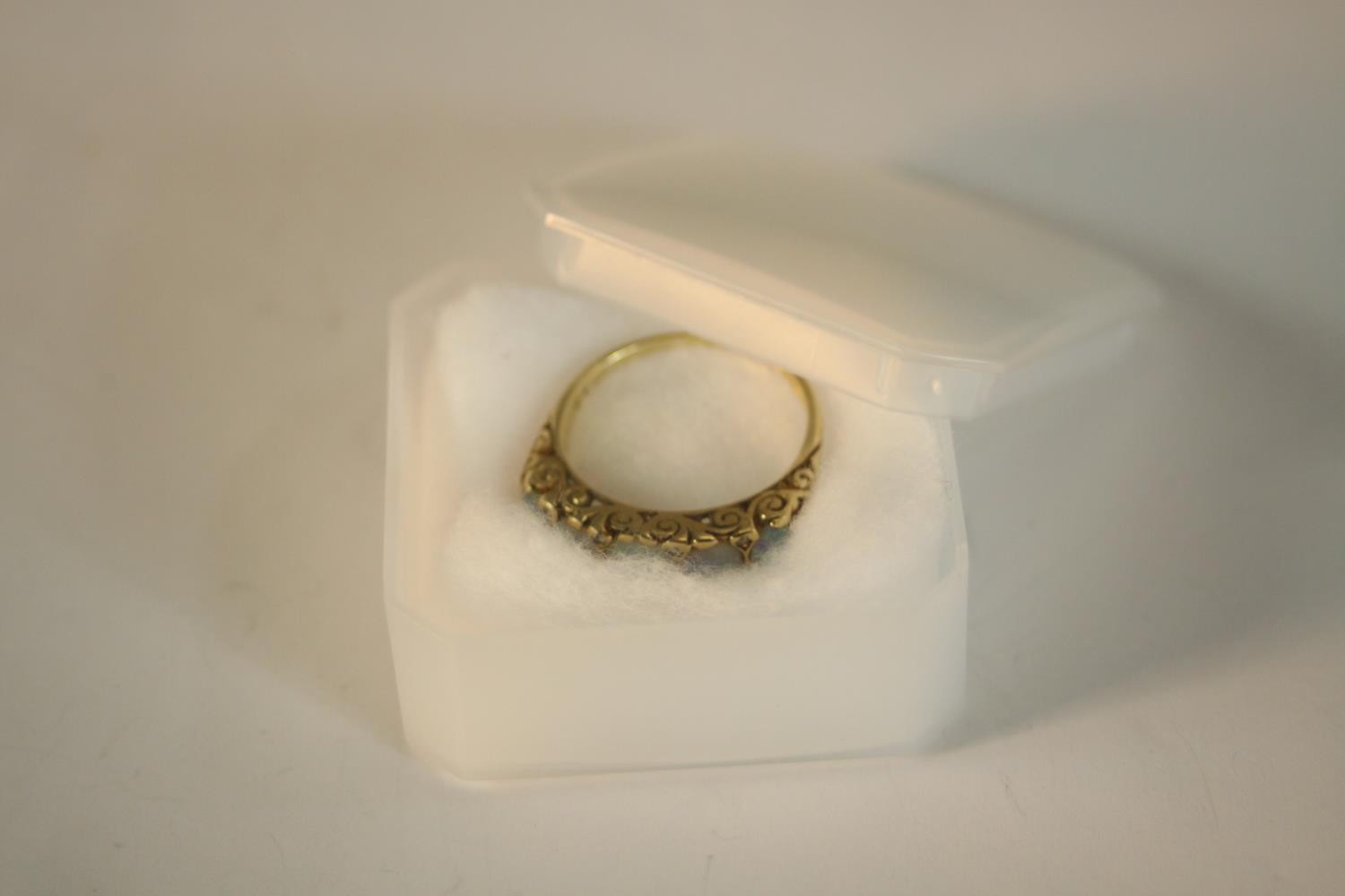 A 9ct carat yellow gold carved half hoop five stone Opal and diamond ring. Set with five round - Image 6 of 10