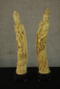 A pair of 20th century Chinese resin figures, moulded as carved ivory tusks, depicting Guan Yu &