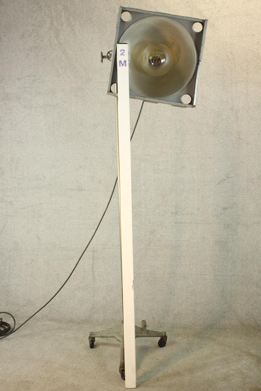 A pair of 20th century pair of industrial floor standing lamps, raised on three splayed supports - Image 14 of 14