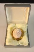 A boxed large 9ct gold framed carved shell Cameo brooch, depicting a classical side portrait (