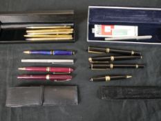 Approximately thirteen 20th century pens to include a engine turned silver Hasti rollerball pen, H.2