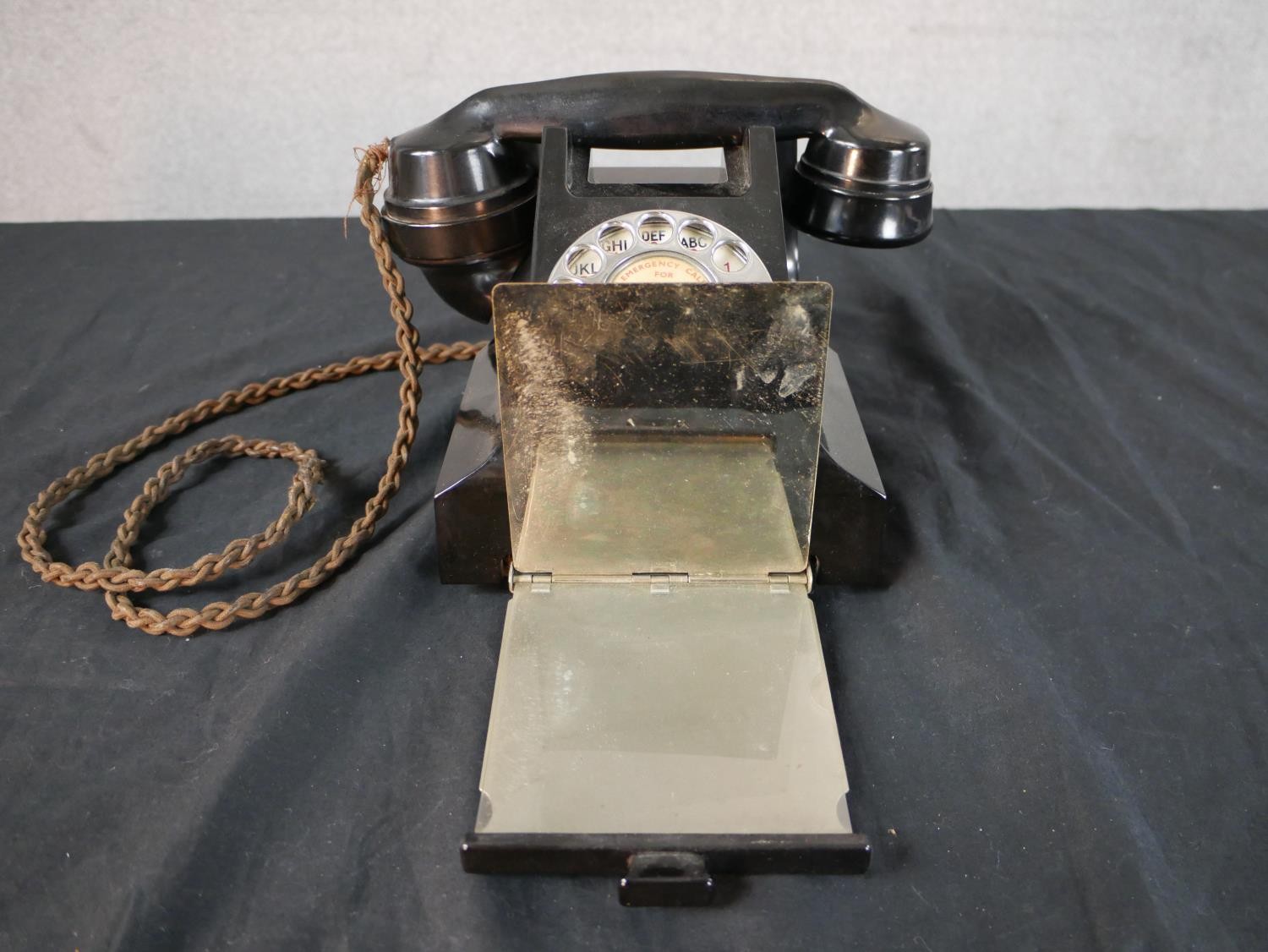 A 1930s/1940s black Bakelite GPO telephone, with white metal dial and drawer. H.14 W.15 D.20cm - Image 4 of 7