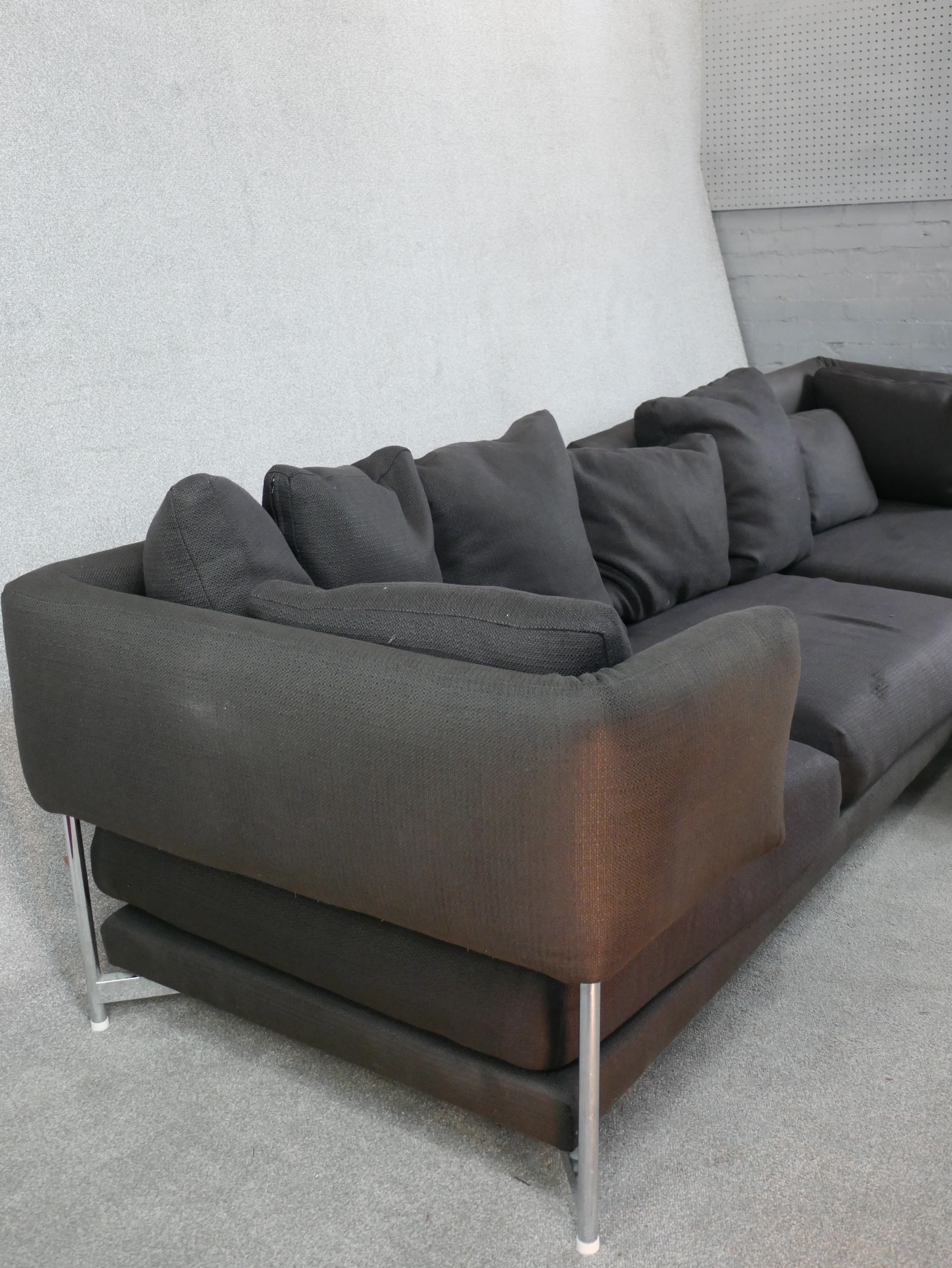 A contemporary grey upholstered L shaped modular settee raised on chrome plated supports. H.73 W.297 - Image 7 of 8