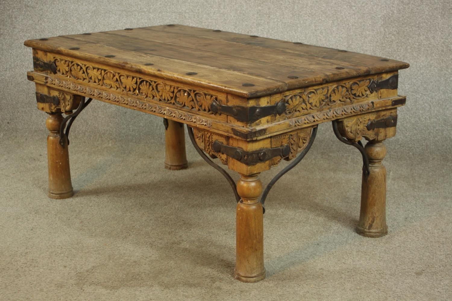 An late 20th century Eastern hardwood and cast iron raised on turned supports. H.44 W.90 D.53cm. - Image 5 of 6