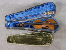 A 20th century F.J. Lee cased violin and bow. H.9 W.79 D.24cm (case)