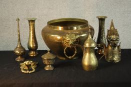 An assortment of mixed brass ware to include a pair of Indian vases, a jardinere with twin lion mask