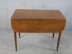 A George III mahogany Pembroke table, raised on turned on tapering supports. H.70 W.92 D.100cm (ext)