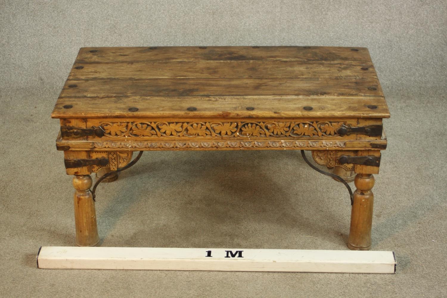 An late 20th century Eastern hardwood and cast iron raised on turned supports. H.44 W.90 D.53cm. - Image 2 of 6
