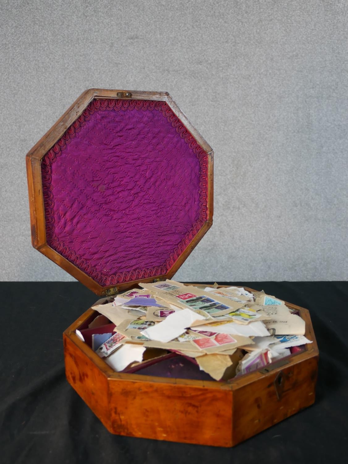 A late 19th century walnut octagonal fabric lined box together with an assortment of loose used - Image 4 of 6