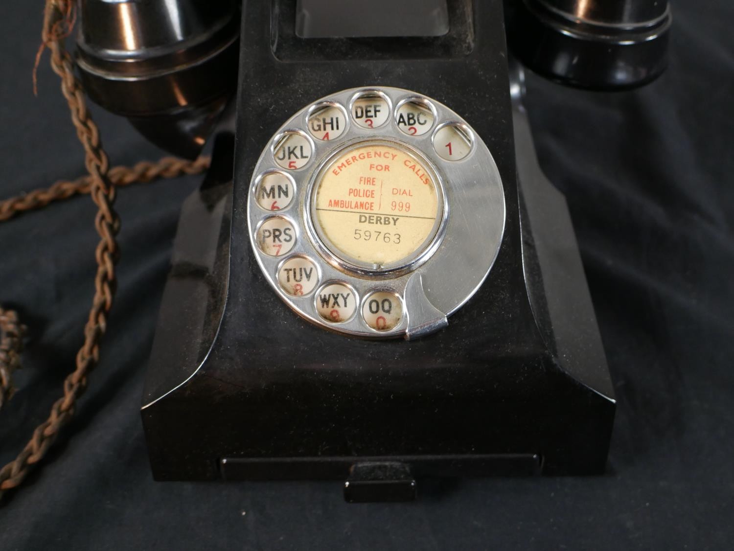 A 1930s/1940s black Bakelite GPO telephone, with white metal dial and drawer. H.14 W.15 D.20cm - Image 2 of 7
