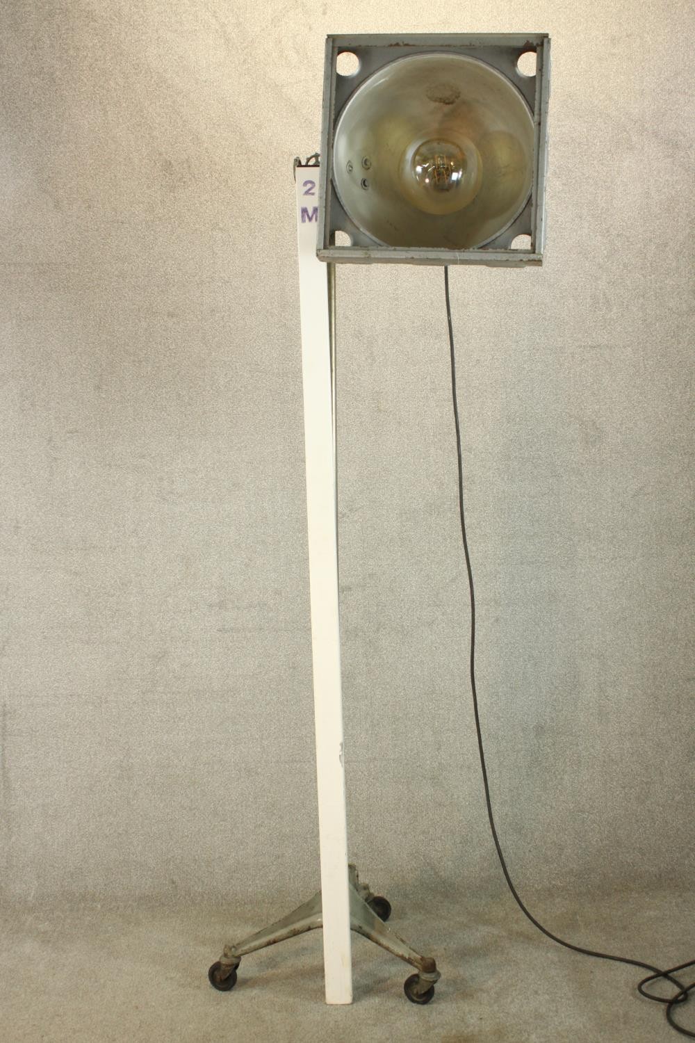 A pair of 20th century pair of industrial floor standing lamps, raised on three splayed supports - Image 11 of 14