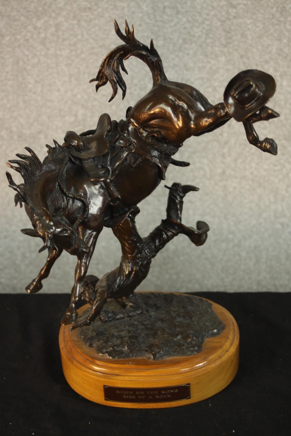Don Toney, 1954, bronze, 'Riding on the Wrong Side of a Wreck', bucking horse with falling cowboy,