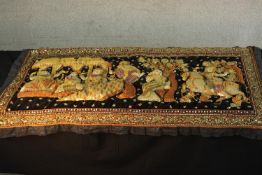 A large 20th century Indian gold thread and sequin jewelled wall hanging of a processional scene.