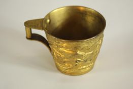 A 20th century Greek Lalaounis gilt metal cup, embossed with mythical creatures, incised marks to