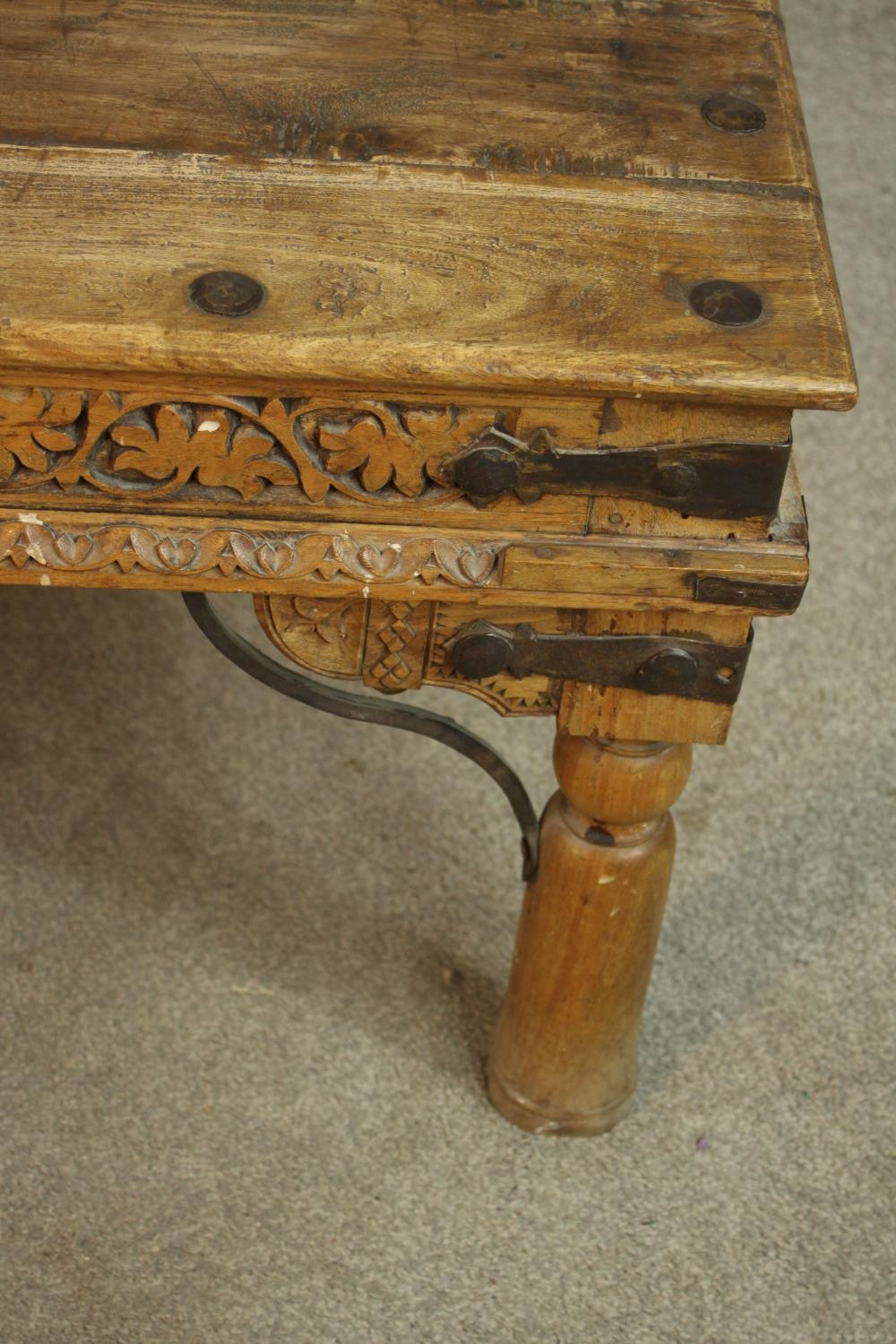 An late 20th century Eastern hardwood and cast iron raised on turned supports. H.44 W.90 D.53cm. - Image 4 of 6