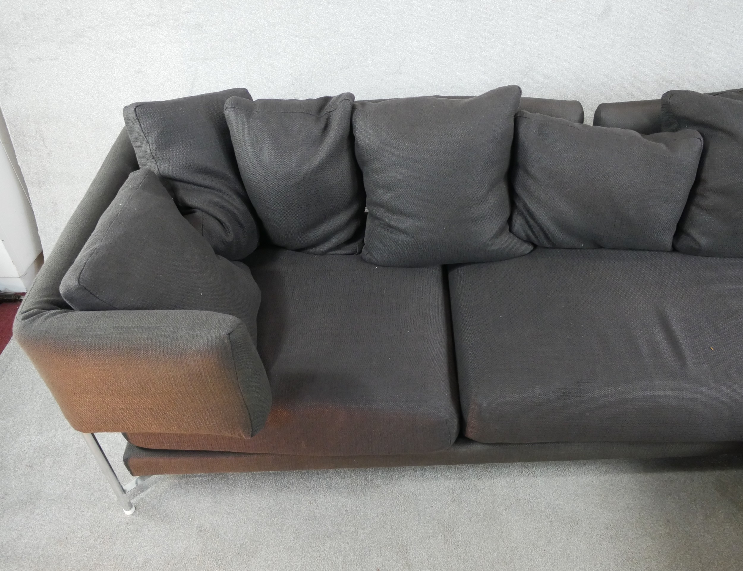 A contemporary grey upholstered L shaped modular settee raised on chrome plated supports. H.73 W.297 - Image 5 of 8