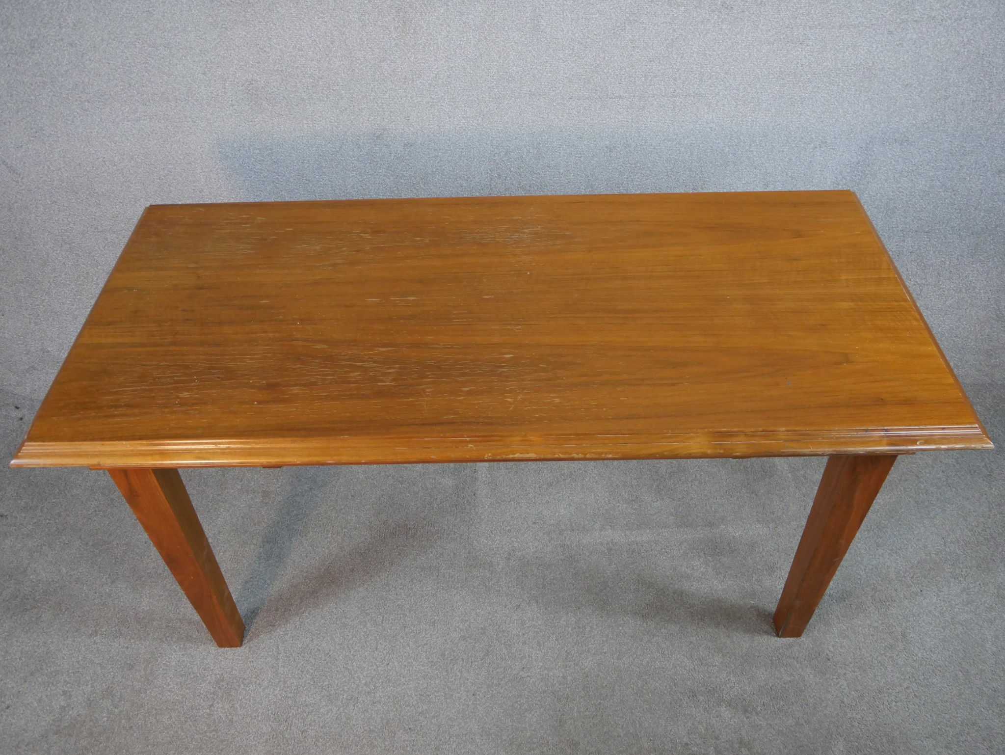 A mid 20th century walnut table raised on tapering supports. H.76 W.151 D.71cm - Image 2 of 5