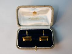 A pair of 18 carat yellow gold rectangular cufflinks of modernist form, 2cm wide, 10.4g gross