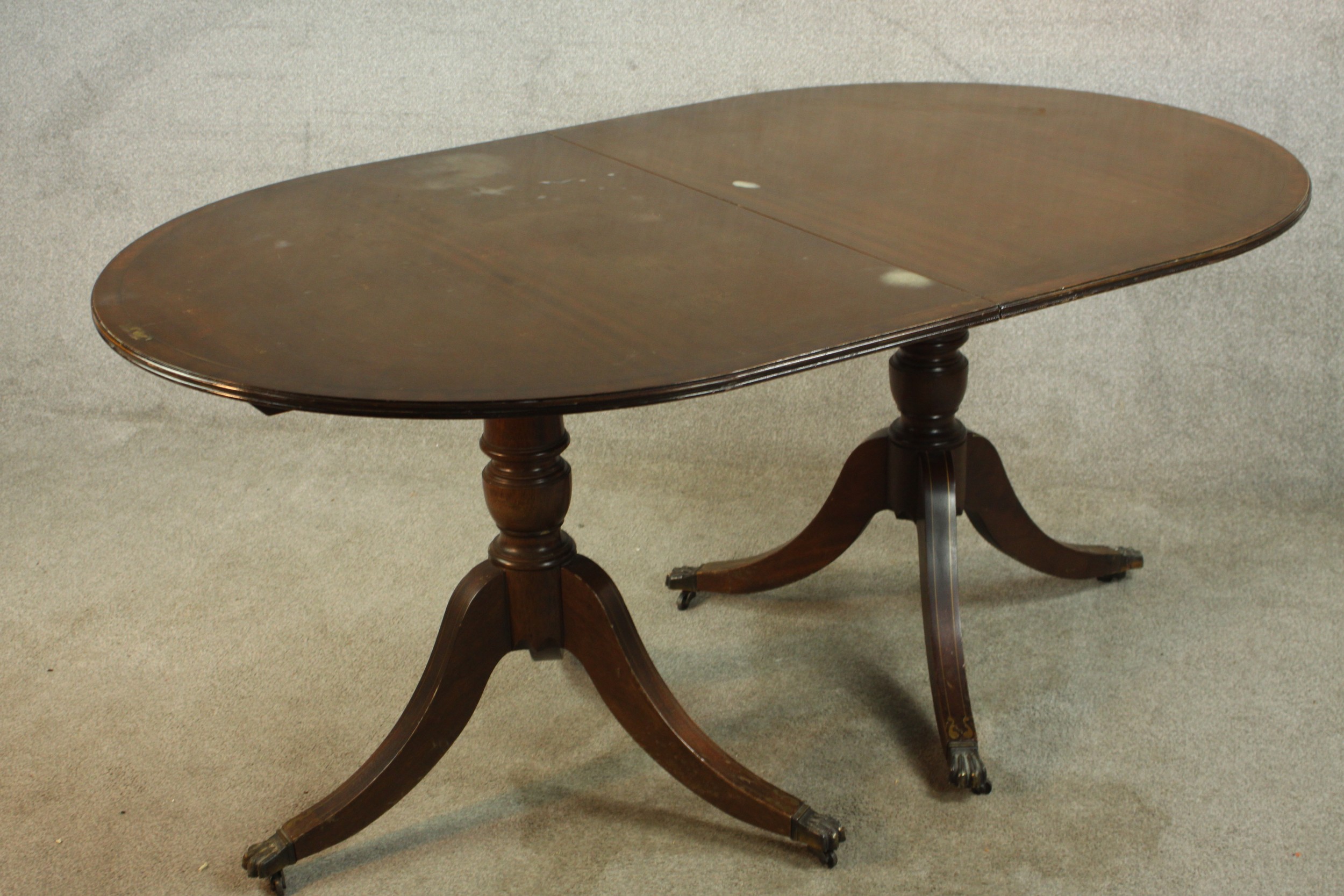 A 20th century Regency style mahogany twin pedestal dining table, raised on turned columns on tripod - Image 3 of 9