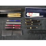 Approximately thirteen 20th century pens to include a engine turned silver Hasti rollerball pen, H.2