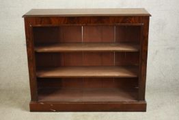 A 20th century mahogany three tier open bookcase, raised on block plinth base. H.102 W.121 D.38cm.