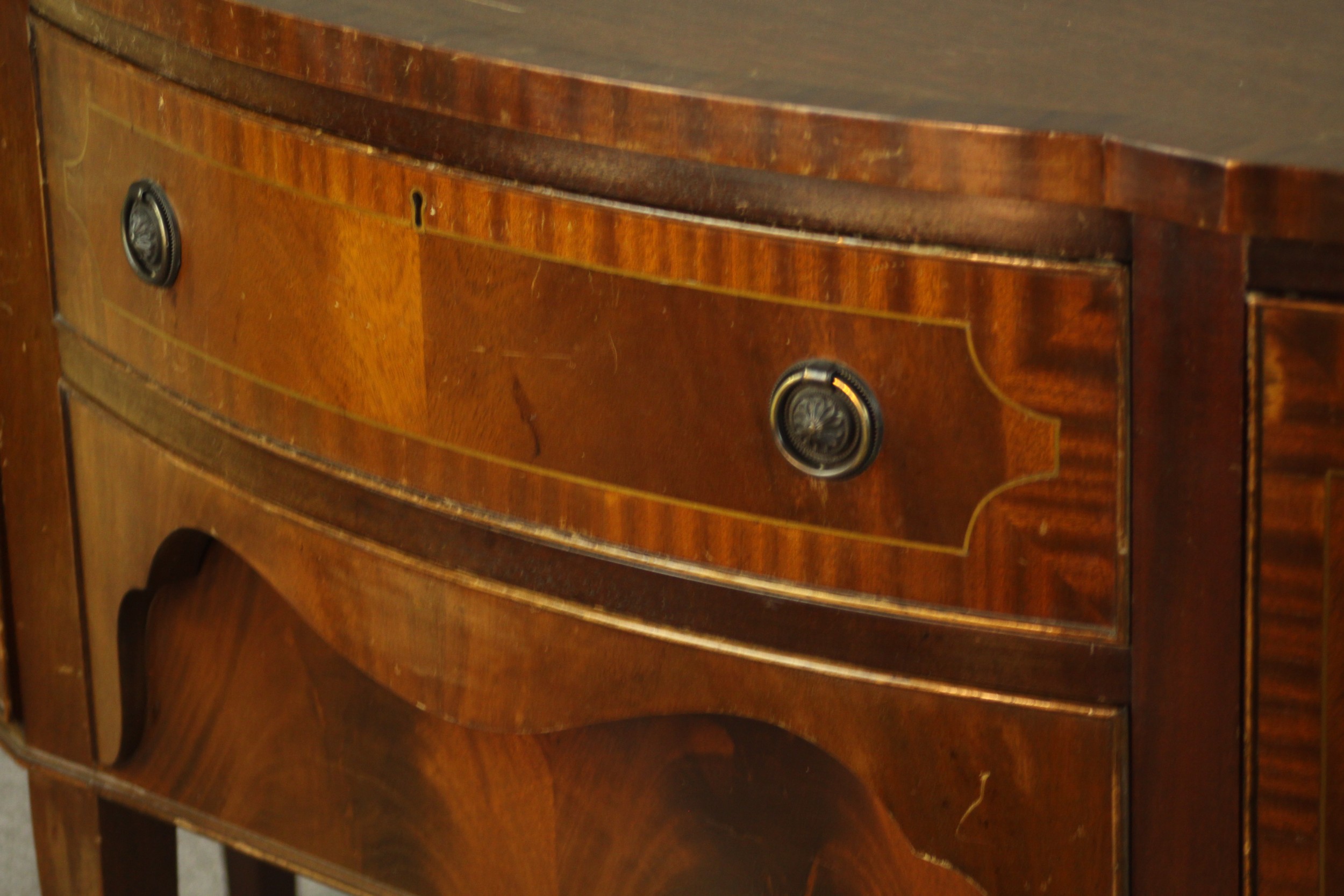 A Regency style mahogany serpentine fronted sideboard, with two central doors flanking two door - Image 10 of 12