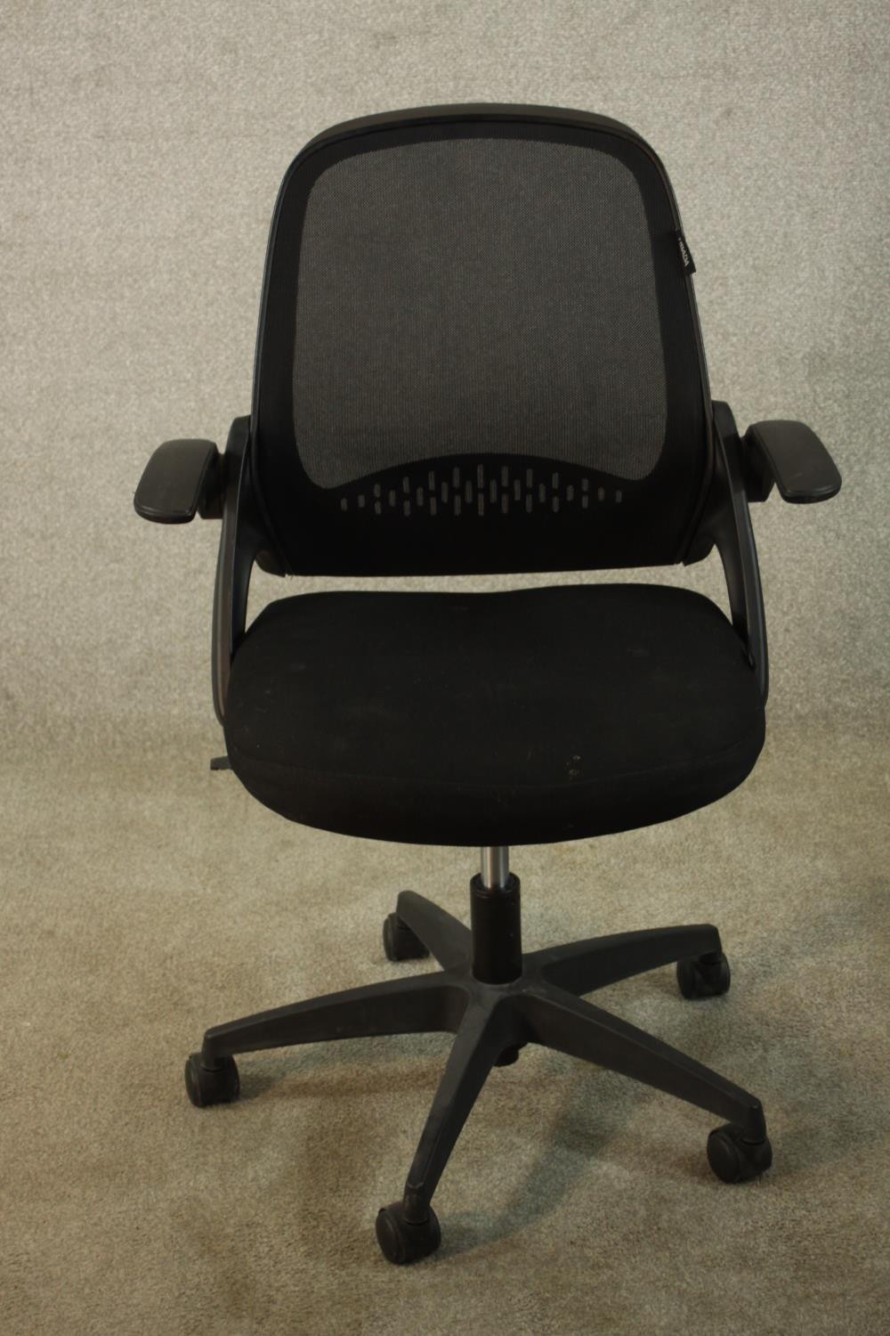 A contemporary Hbada open arm office chair, raised on five splayed supports terminating in casters.