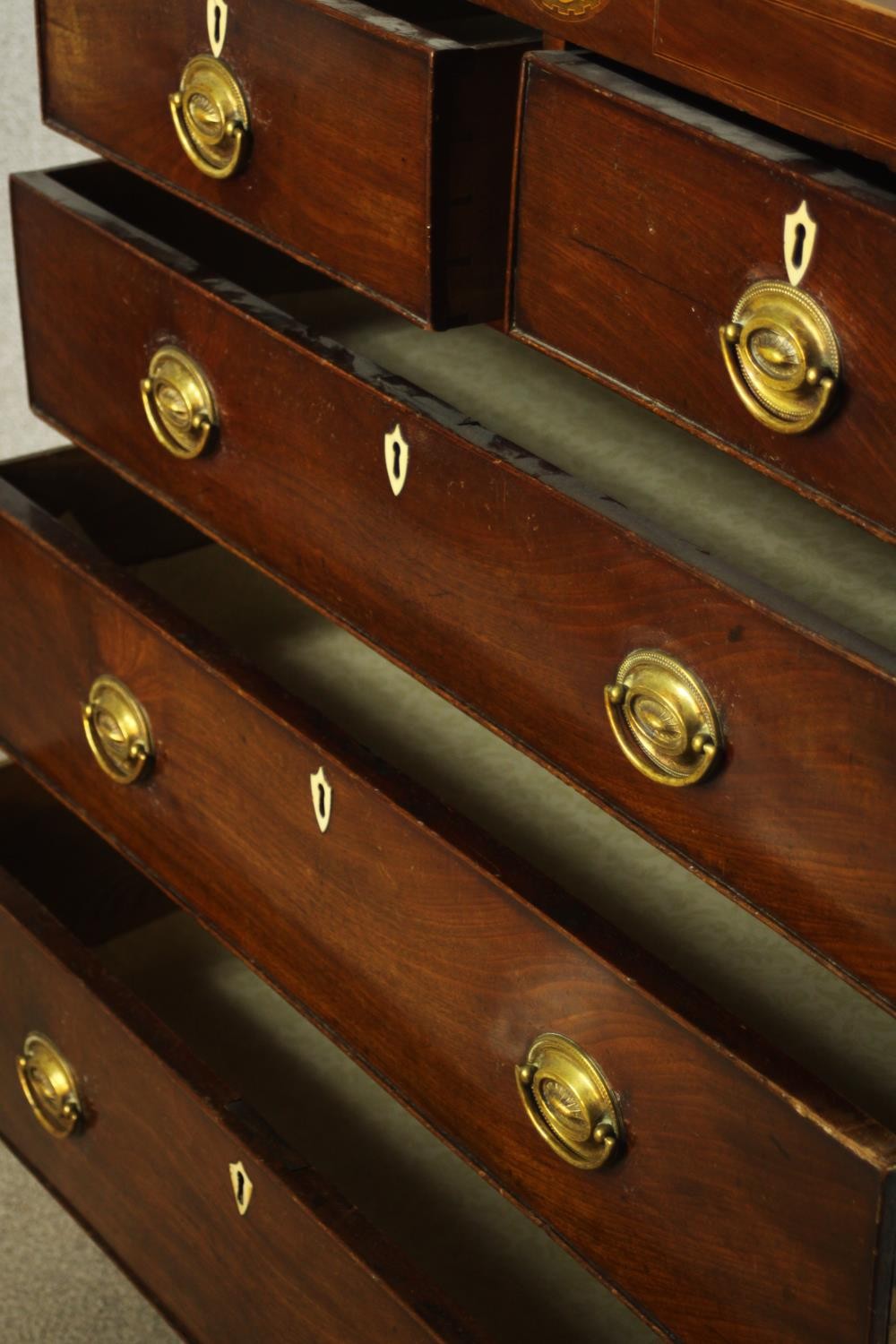 A Georgian inlaid mahogany chest of two short over three graduating drawers, raised on shaped - Image 8 of 8