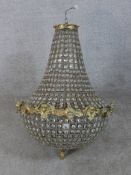 A contemporary gilt and glass hanging basket form light fitting. H.80 W.59 D.59cm