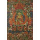 A framed and glazed early Tibetan Buddhist Thangka, possibly 17th century, depicting a Buddhist to