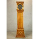 A 20th century Danish Bornholm style pine cased longcase clock, the brass and silvered dial with