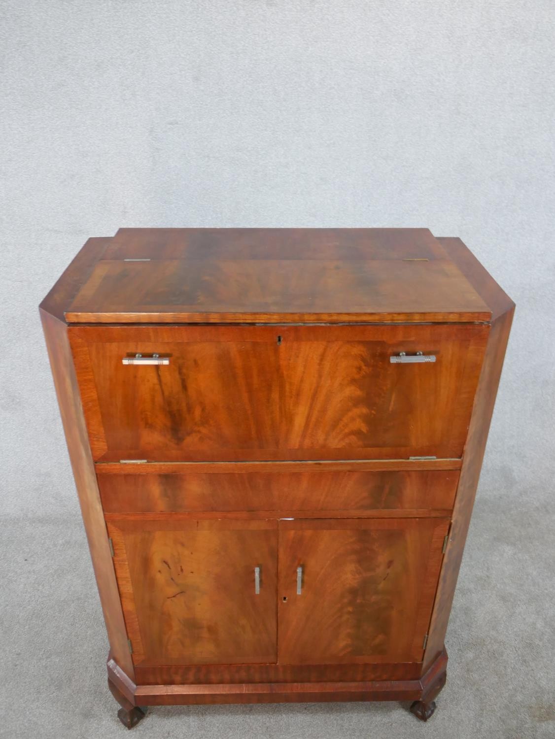 A 1930s walnut veneered drinks cabinet, the hinged lid opening to reveal fitted interior, with - Image 2 of 9