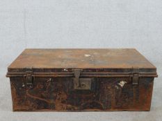 A 20th century black painted military issue metal trunk. H.29 W.86 D.52cm