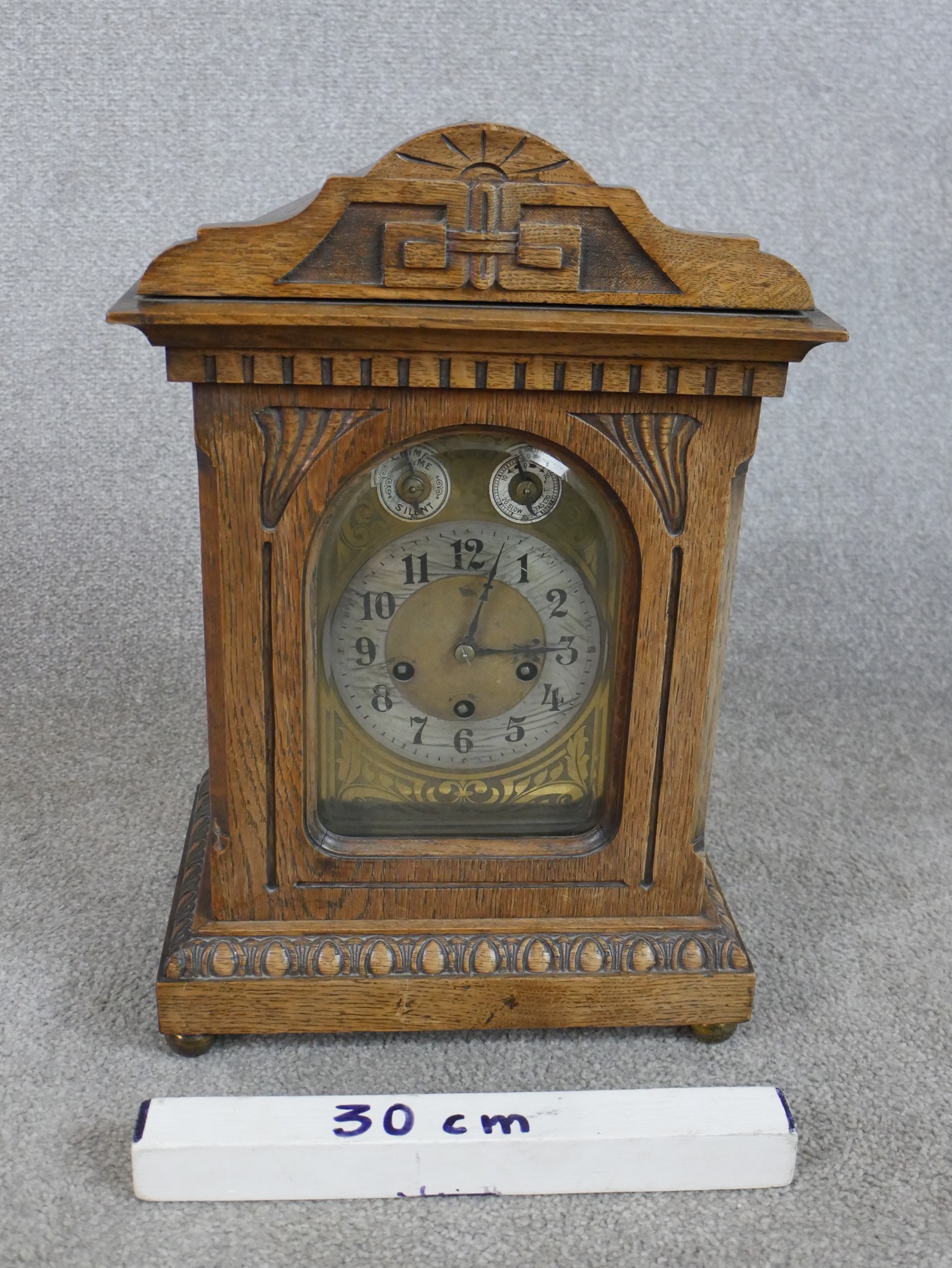 A late 19th/early 20th century carved oak mantle clock, the brass dial with black Arabic numerals, - Image 2 of 5